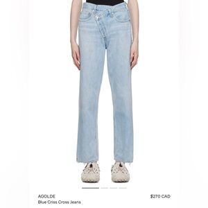 Agolde cross cross light blue jeans in size 26.